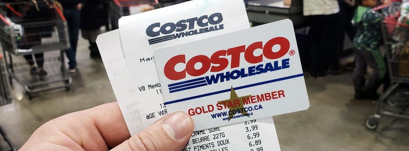 A Costco customer with their membership card.
