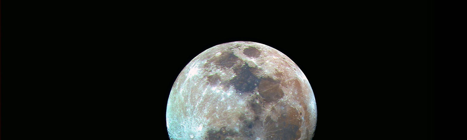 a close-up photo of the moon with a pitch-black background.