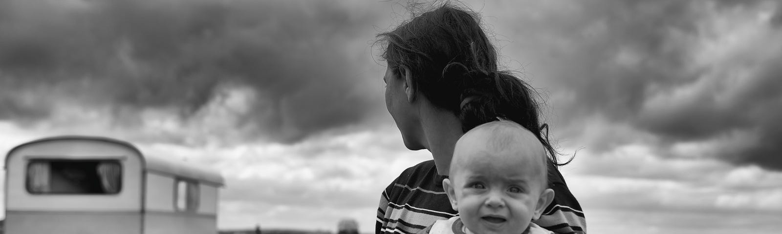 A mother and child find a home in a caravan park.