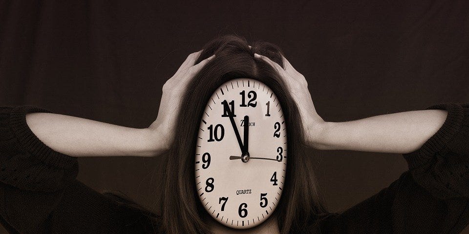 Representation of women in stressed out condition with a face of clock