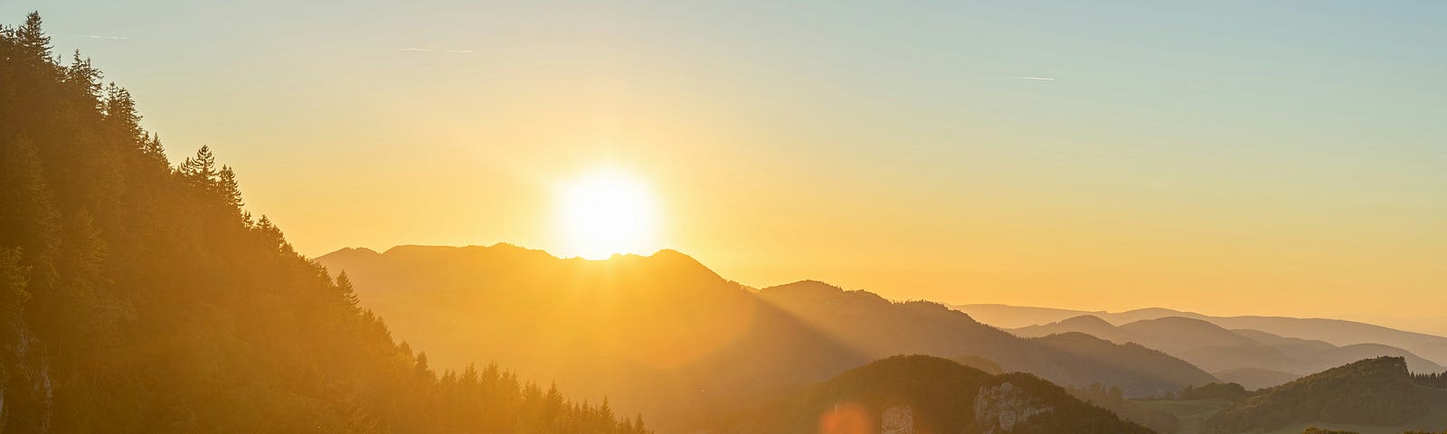 Picture showing a mountain with a sun.