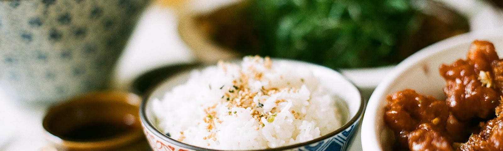 A delicious bowl of rice waits on the table to eat mindfully.