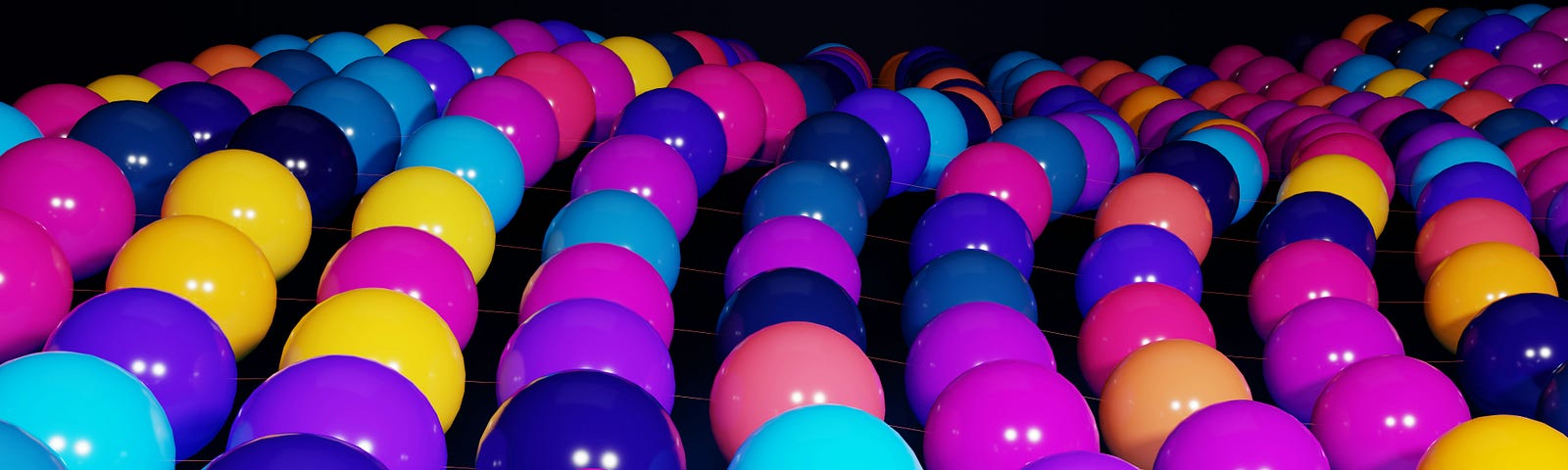 rows of coloured balls denoting atoms