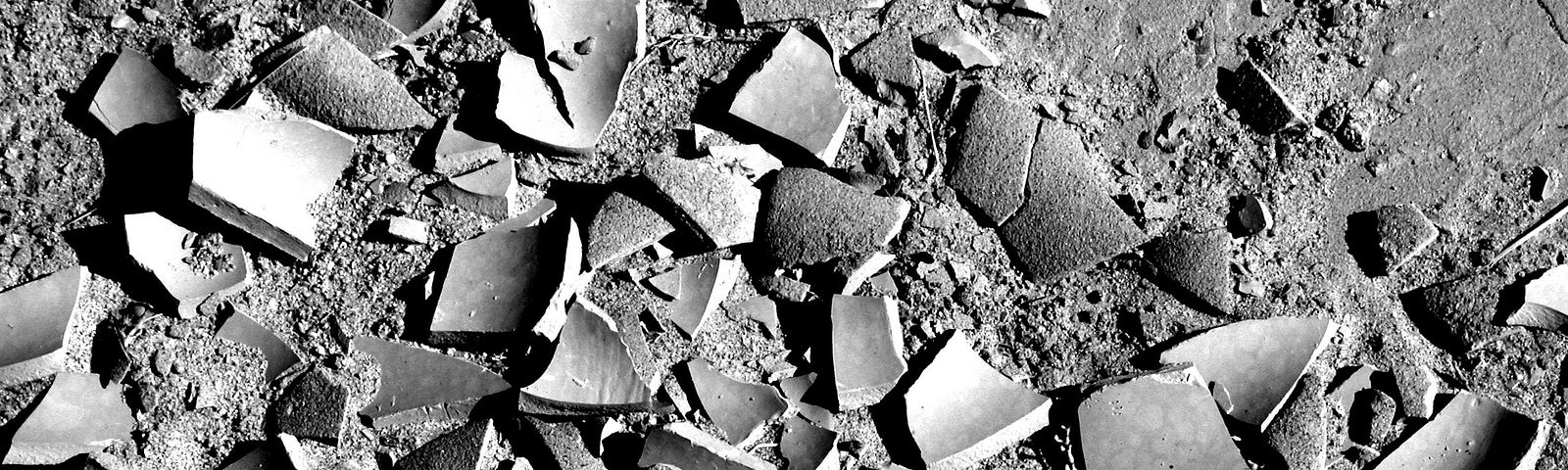 shards of pottery on the ground