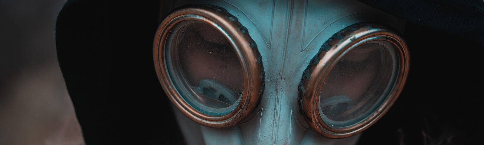 portrait of a person wearing a gas mask