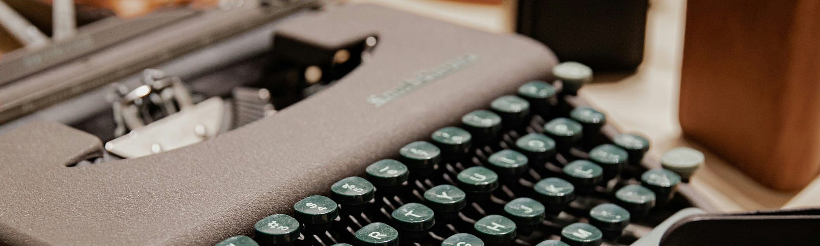 Why are there blocks of wood surrounding this typewriter? This better not be a joke on us the readers…