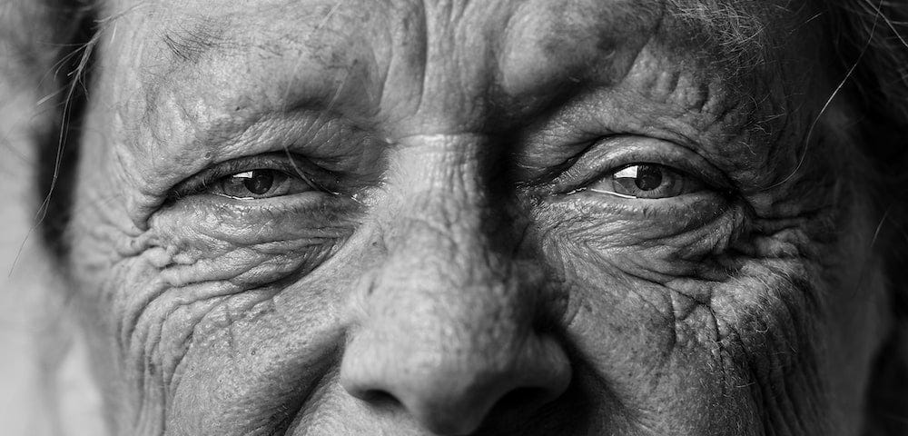 An old woman’s face in black and white