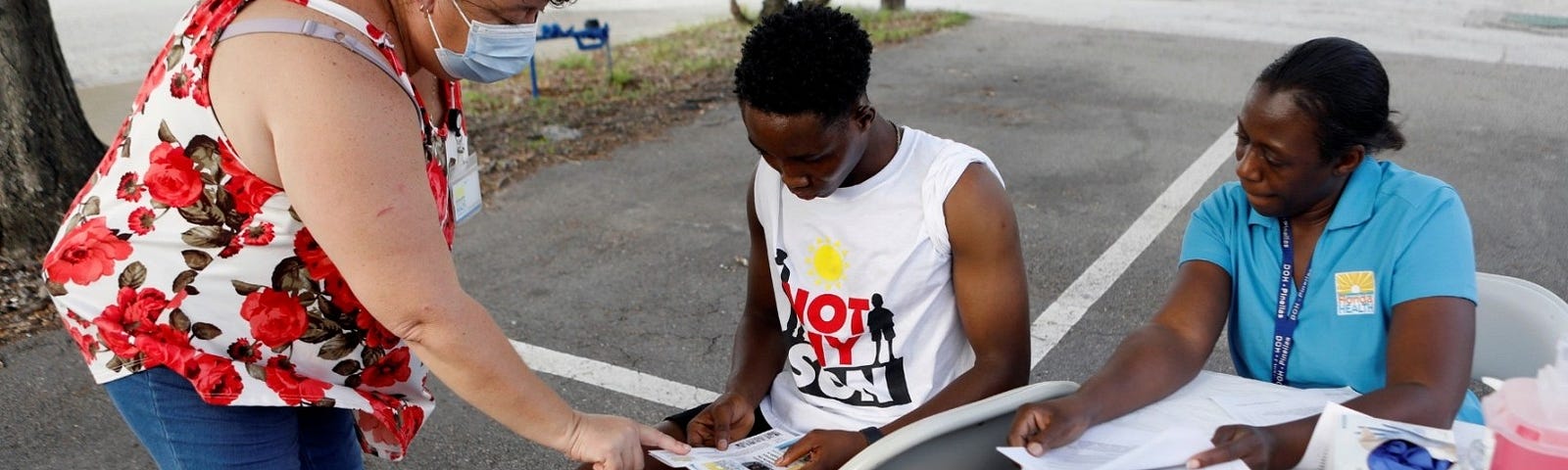 Dieumeeci Ufitimana, ©signs up to receive the COVID-19 vaccine at Bethel AME Church in St. Petersburg, Florida, July 23, 2021. Photo by Octavio Jones/Reuters