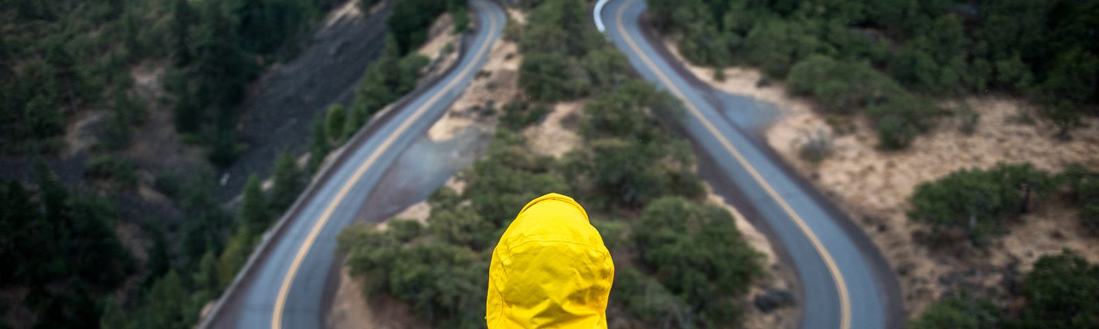 person overlooking a road