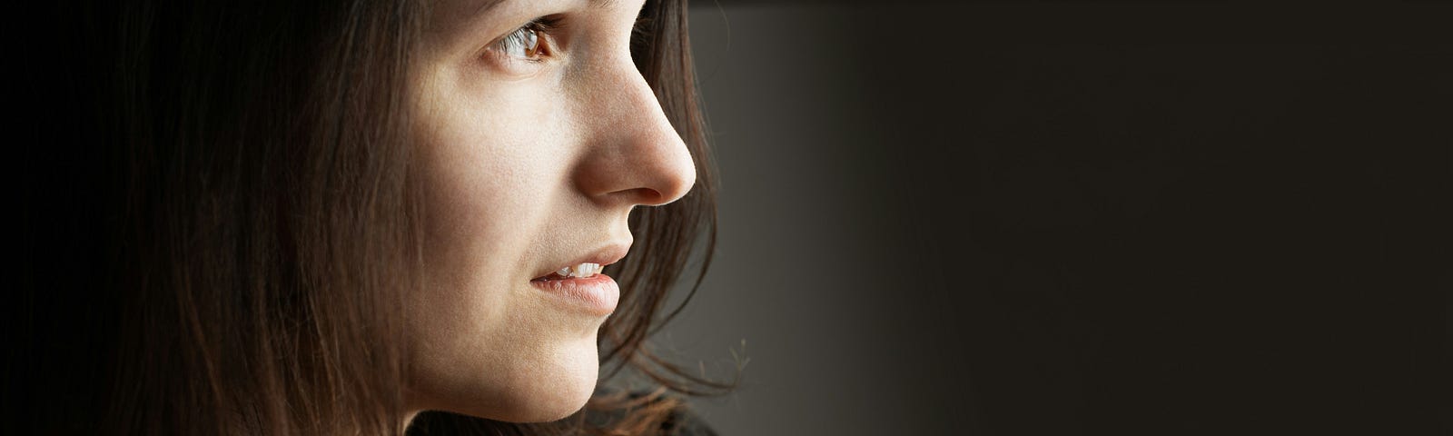 Woman wearing a worried look on her face.