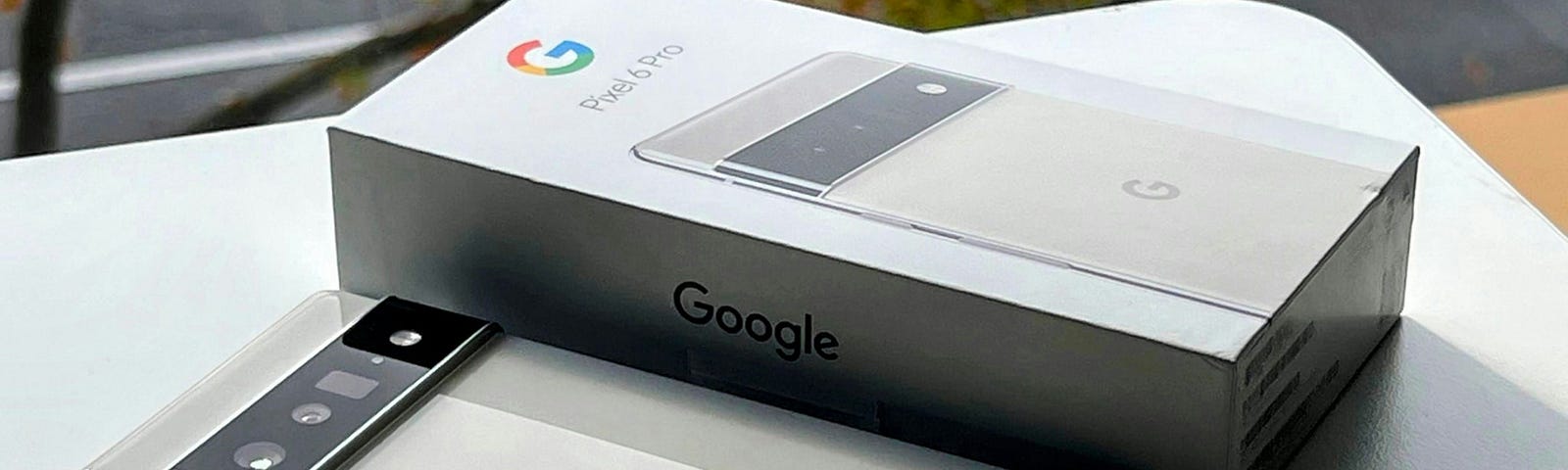 Picture of Pixel 6 Pro next to its package on a table