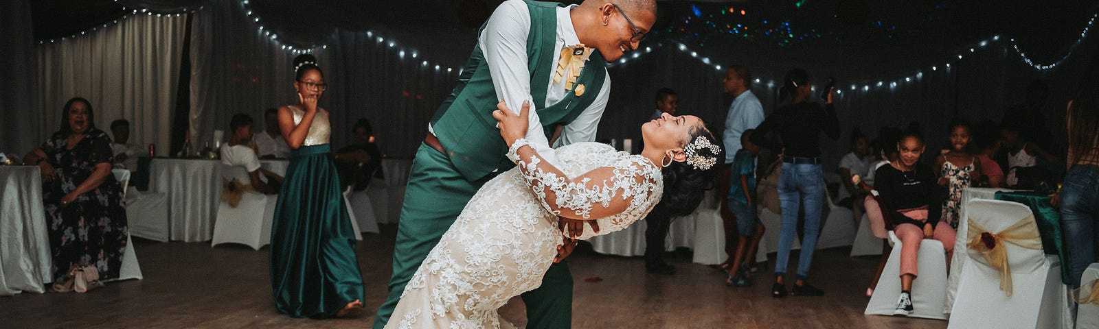 Bride and groom dancing alone at their wedding