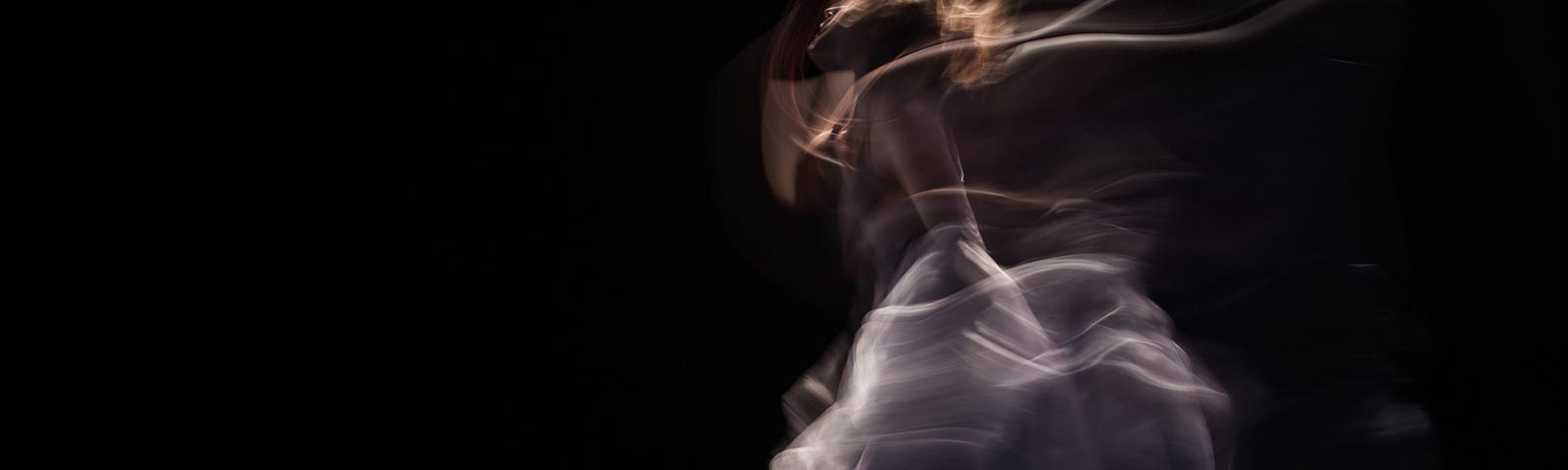 A woman dancing, whirling