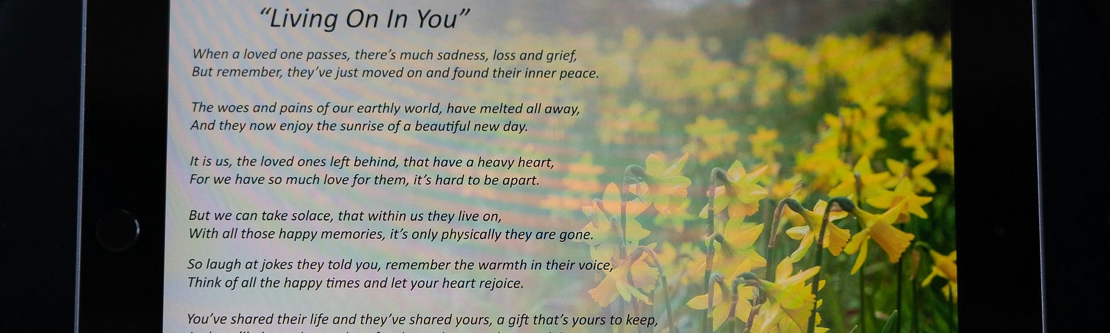 Rhyming poetry titled “Living on in you”.  Yellow buttercups in the photo screen displayed with the poem.