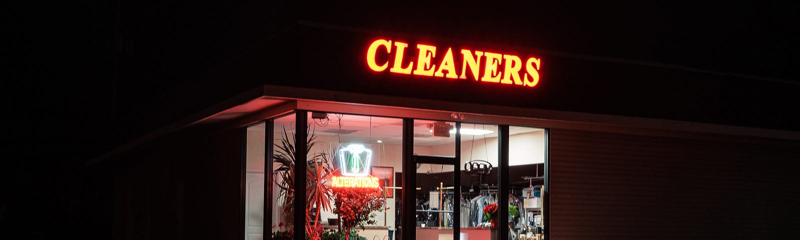 A dry cleaner at night. The inside of the building is lighted. An international team of researchers recently concluded that the chemical trichloroethylene is associated with as much as a 500 percent increased risk for Parkinson’s disease.