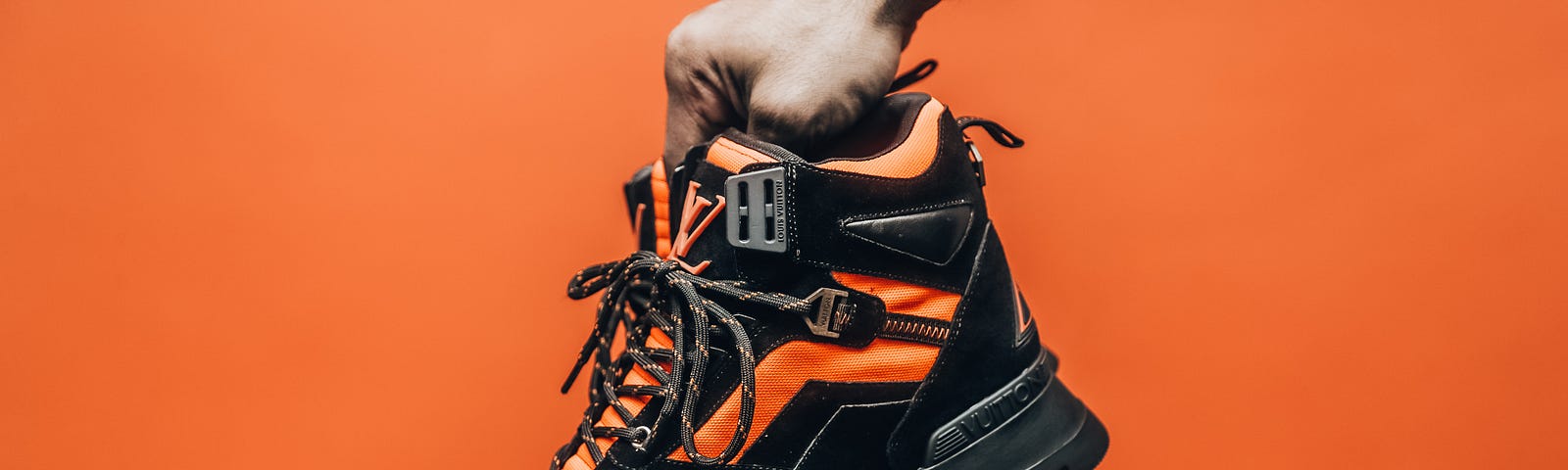 black and orange hiking boots