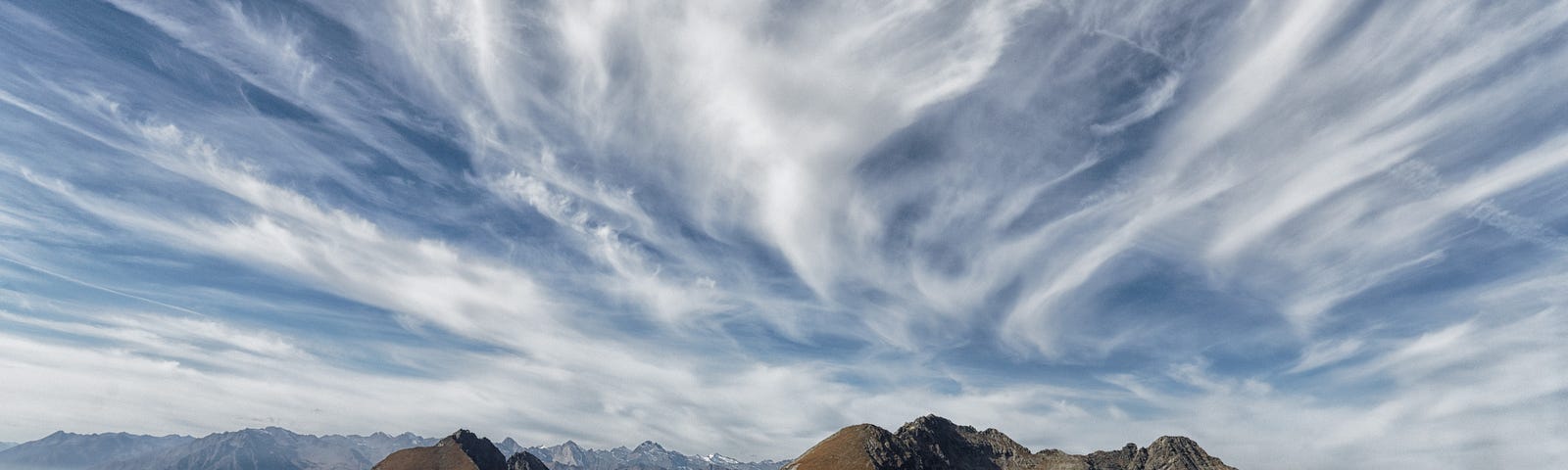 Cloudy sky over mountains.