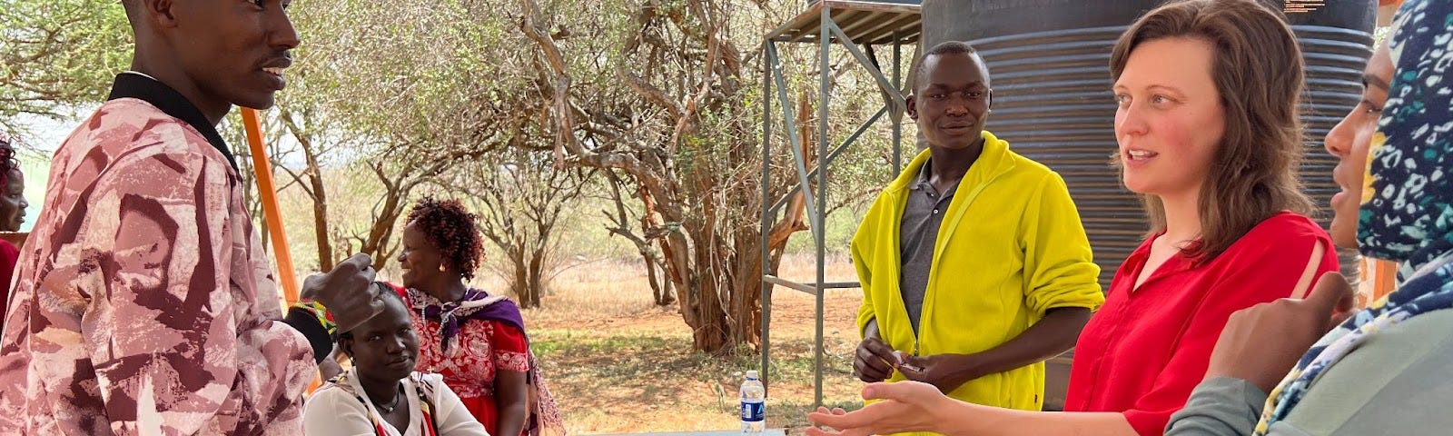 Molly Blank, biomedical engineer at Variant Bio (second from right), soliciting feedback on part of a proposed protocol during a community engagement event in Kenya.