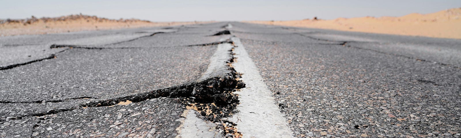 A road cracked from a recent earthquake.
