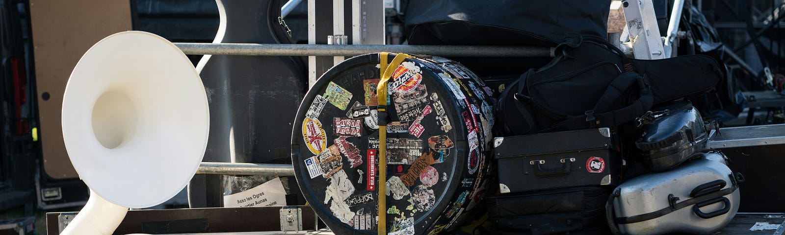 Many instrument cases, the baggage of an orchestra.