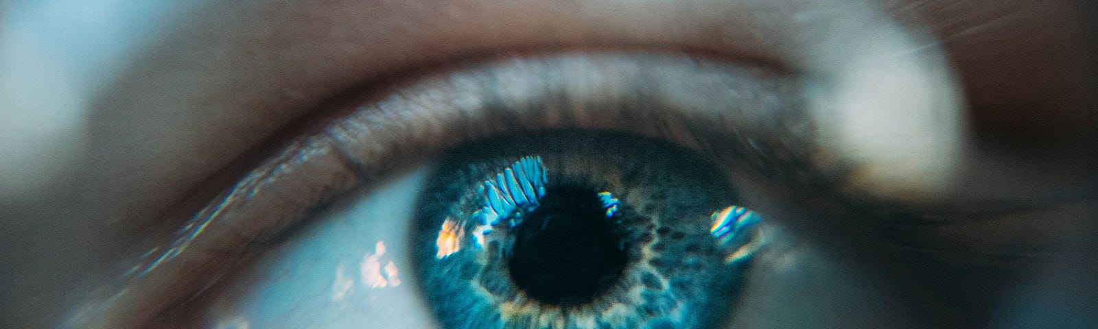 a close up of a blue eye