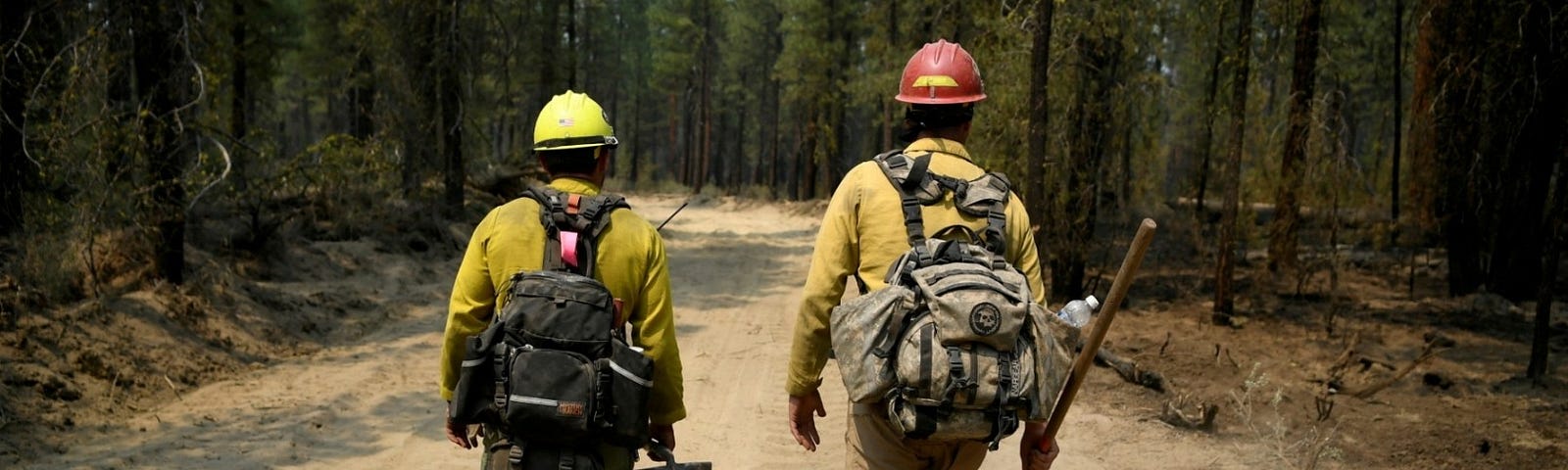Firefighters mop up hotspots in the northwestern section of the Bootleg Fire as it expands to over 210,000 acres, Klamath Falls, Oregon, July 14, 2021. Photo by Mathieu Lewis-Rolland/Reuters