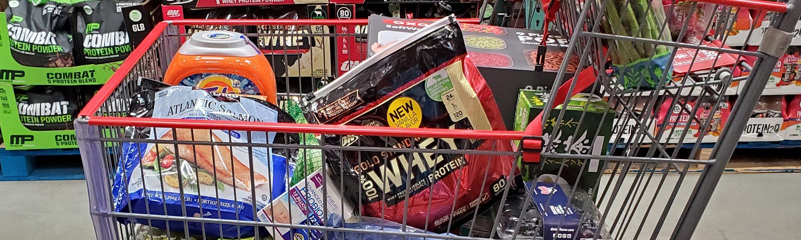 A Costco shopping cart filled with items.