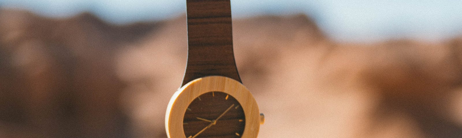 A floating watch looked like carved of wood  as the symbolic metaphor to this article’s title/subtitle: The Ultimate Trip Back in Time, An inventive virtual journey of an architecture addict’s arch-zeal