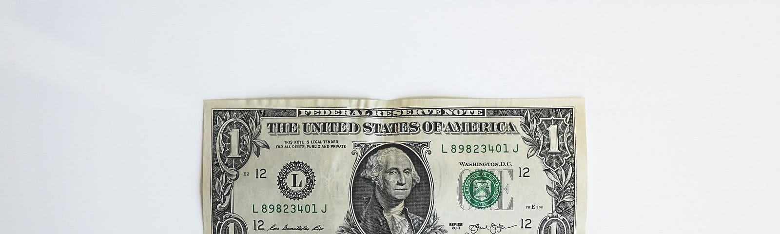 A white background with a $1 bill in the center.