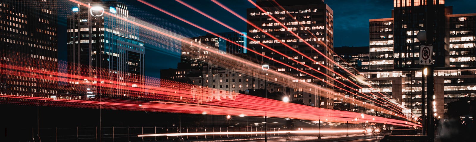 Night image with light traces from fast cars