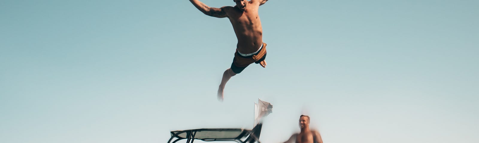 A young white adult flings himself off of a platform into the water. We see him from the water’s perspective. Forty-two percent of new cancer may be avoided if you make risk-reducing lifestyle changes. Small changes can result in outsized changes in risk. This article explores three key ways to reduce your cancer risk.