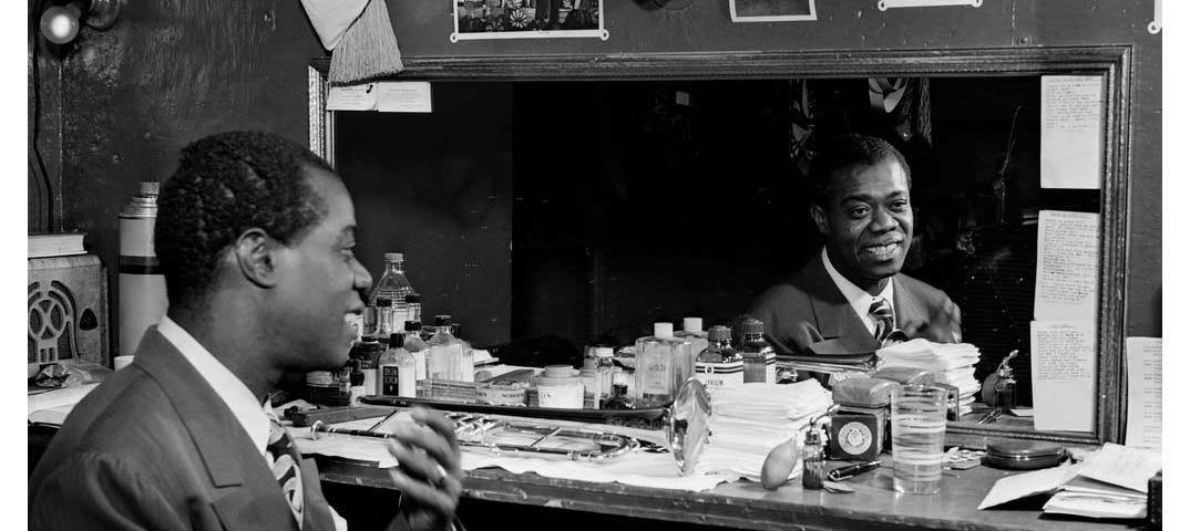 Louis Armstrong in his dressing room.