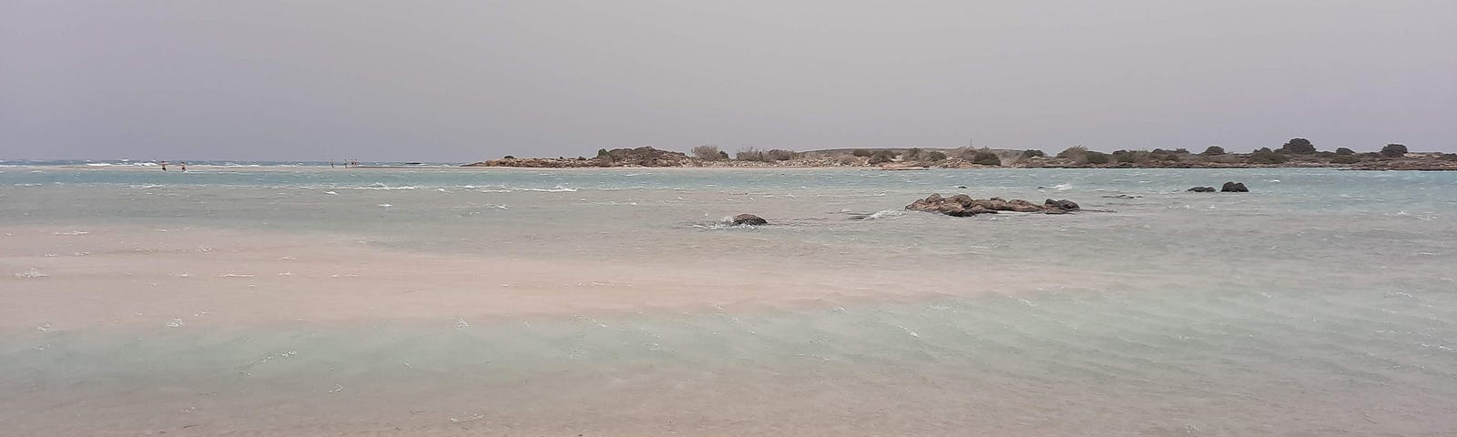 A beach with pink sand.