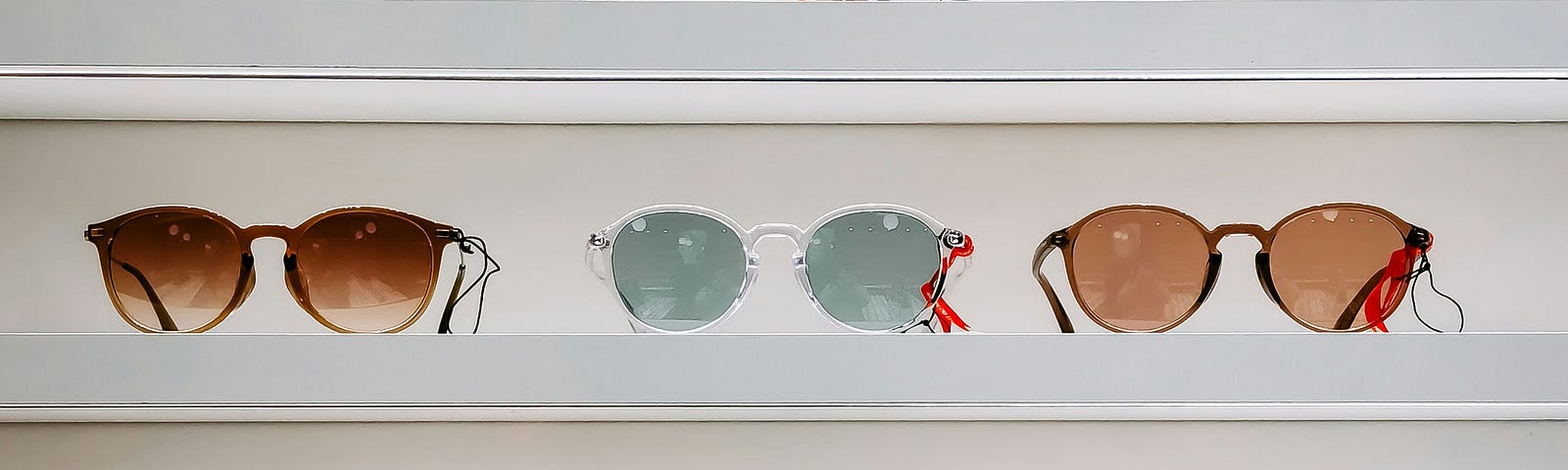 Sunglasses on a wall display
