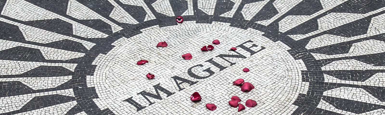 Mosaic with the word IMAGINE at its center.