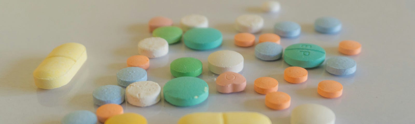 Different colored, different-sized pills.