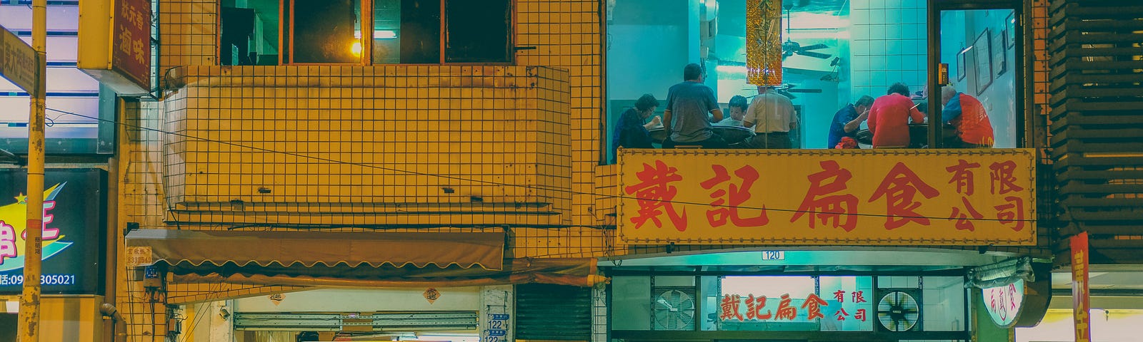 Evening street foods, people eating with friends and family in Taiwan