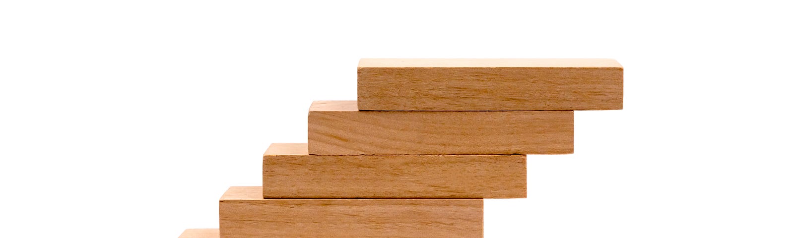 A stack of wooden blocks that may become unbalanced