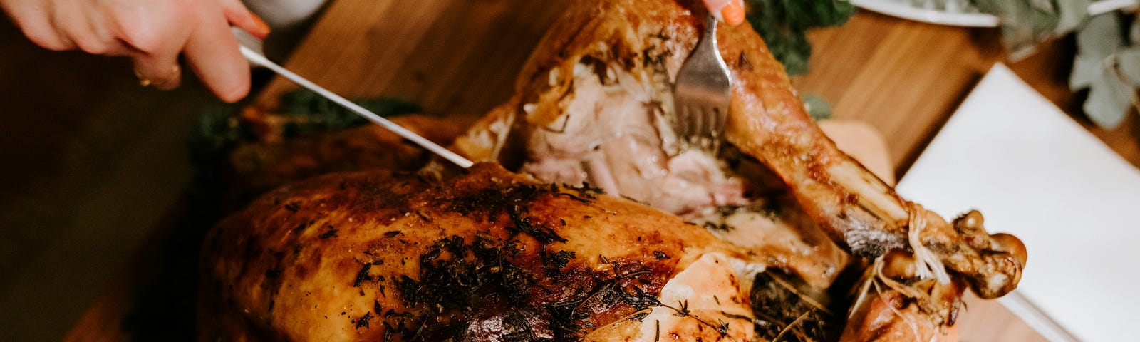 A Thanksgiving turkey being cut into