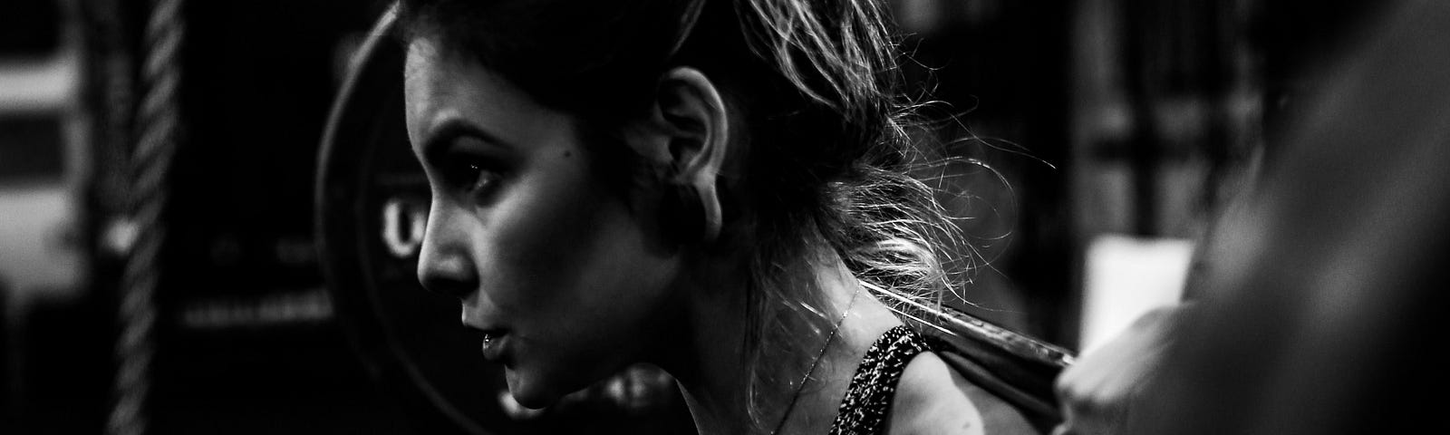 A woman working out in a gym.