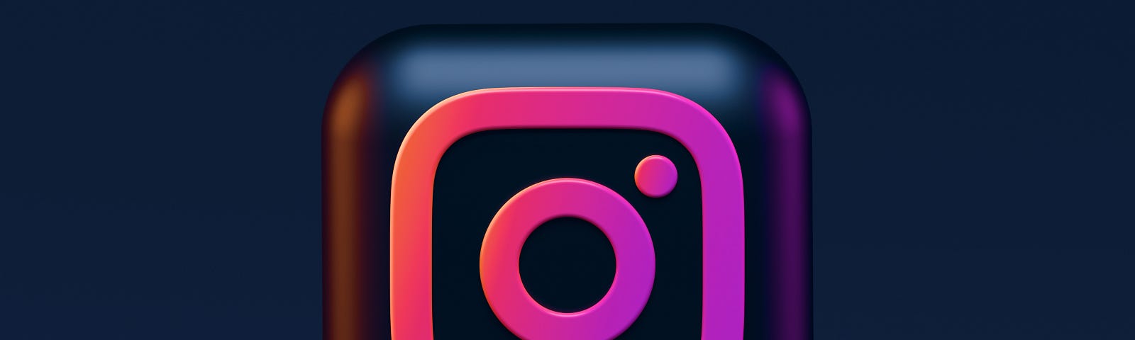 Black and bright pink instagram logo on cube.
