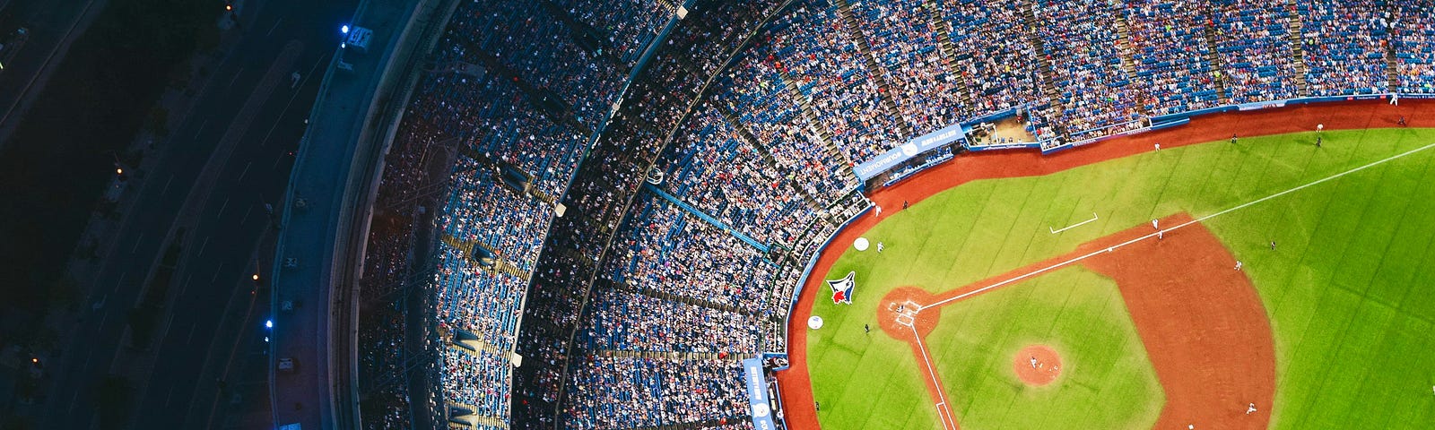 An arial view of a baseball stadium (night).