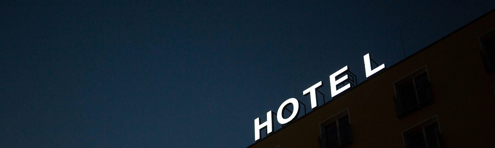 The word HOTEL on top of a building