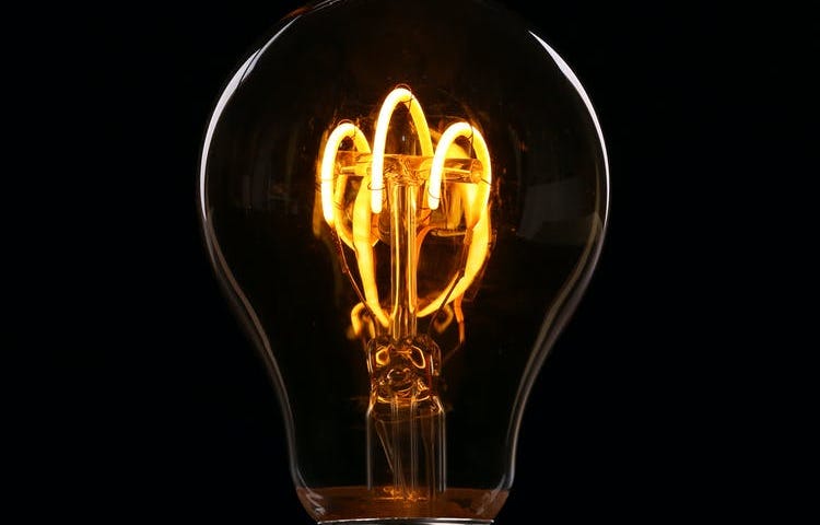 A close up of a lit lightbulb