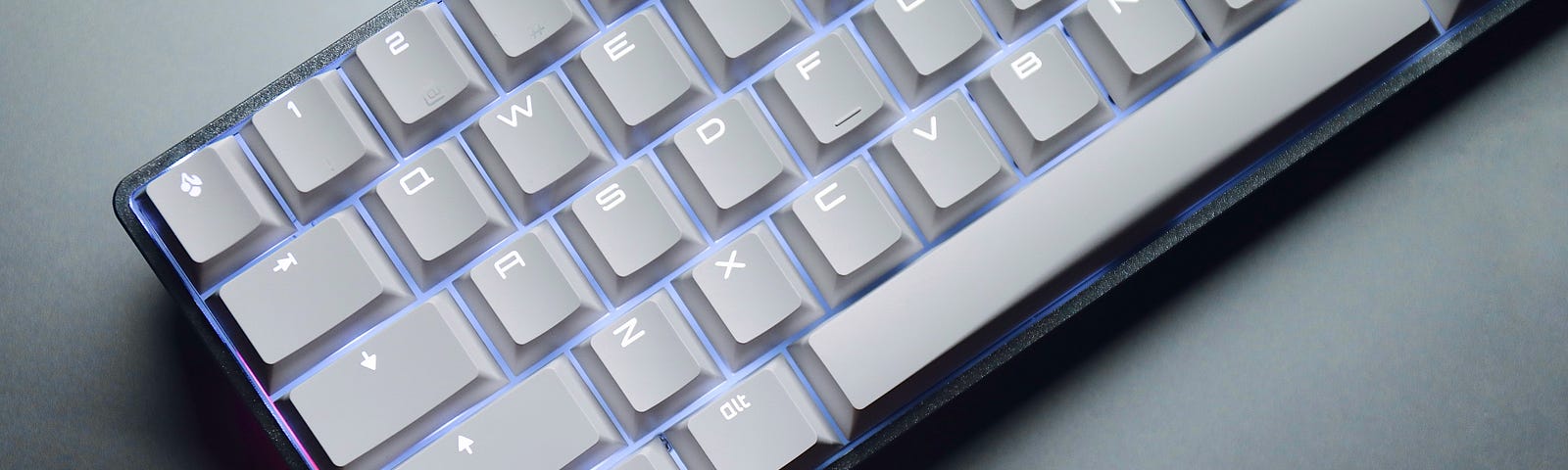 a white mechanical keyboard with white leds