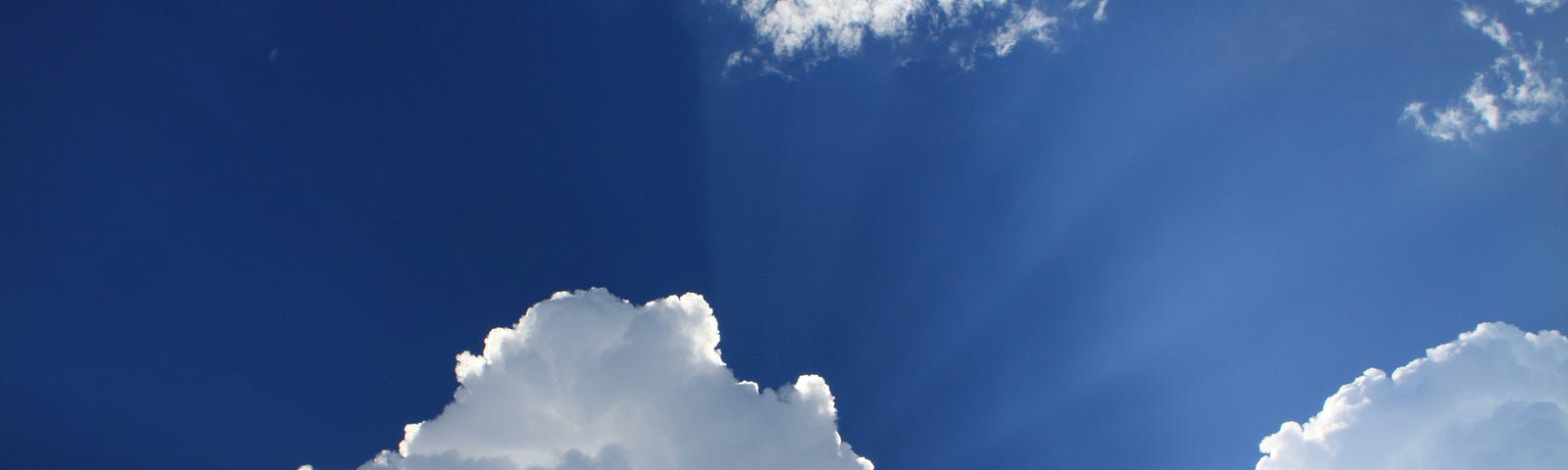 White clouds in a bright blue sky