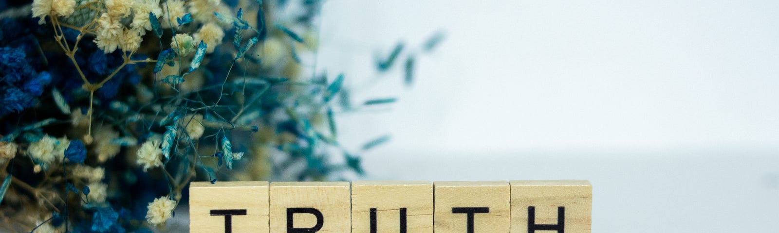 Scrabble letters spelling the word “Truth”