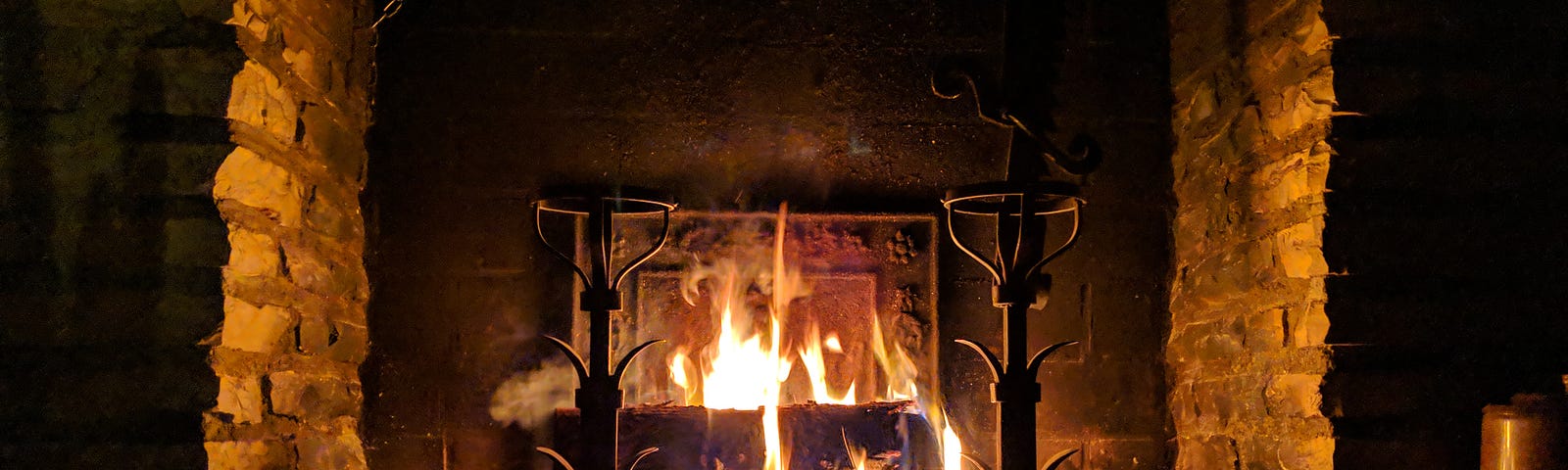 beautiful stone fireplace ablaze