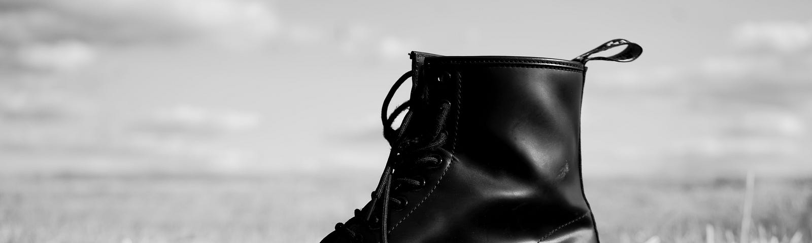 picture of one black leather boot