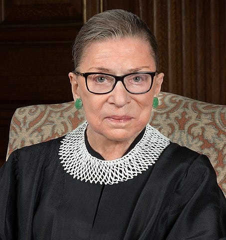 A head on picture of the late Supreme Court Justice Ruth Bader Ginsburg in her robes.